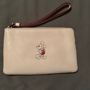 Coach Disney Wristlet Mickey Mouse white. Used very good condition